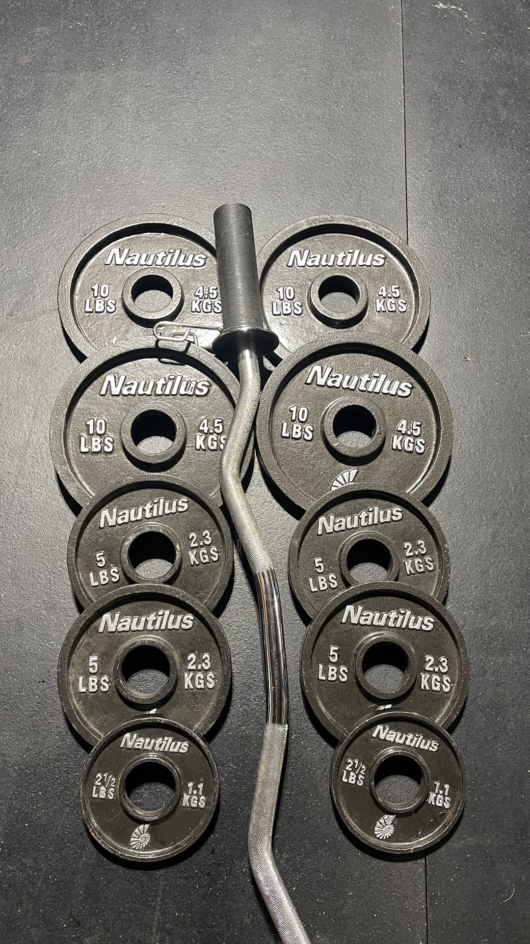 OLYMPIC CURLBAR AND WEIGHTS