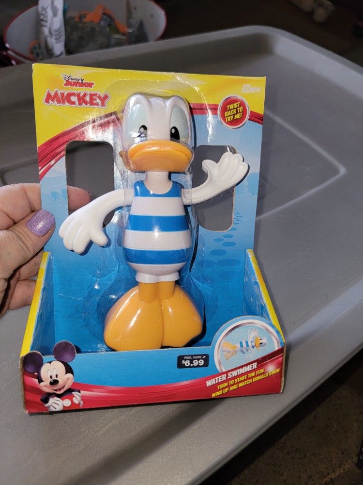 NEW DONALD DUCK WATER SWIMMER SWIST, AND WATCH THEM ARMS GO.  