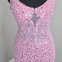 Pink beaded prom dress with sequins and a slit