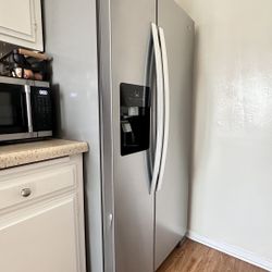 $699 (OBO) 66 x 32" Stainless steel, fridge 1 Year Warranty.
