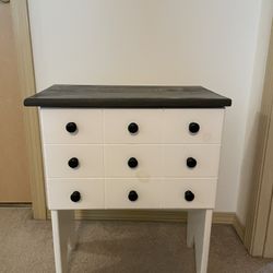 Super cute All Wood small side table. 24” tall, 19.5” wide, 11” deep. Couple smudges pictured otherwise great condition. Top opens for storage 