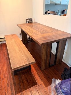 Dark brown dining table and bench