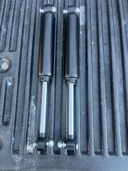(2) 14” black shocks