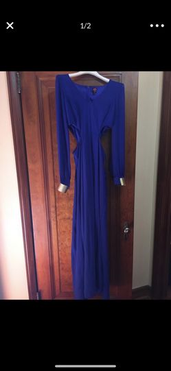 Royal blue cut out dress. With gold cuffs