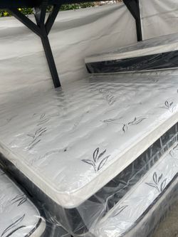 King Size Mattress Pillow Top 12"    New Mattress in a plastic sealed.   We offer same day delivery