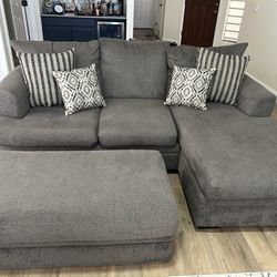 Cornell Pewter Sofa With Chaise And Storage Ottoman