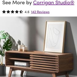 TV stand for "50 TV Console Table.  Natural Oak color- New in a box(was never opened)