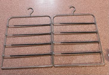 Two vintage space, saving hangers