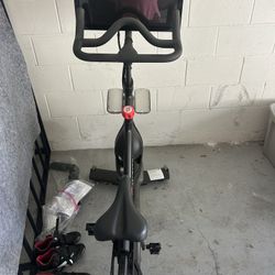 Peloton Bike And Three Sets Of Shoes