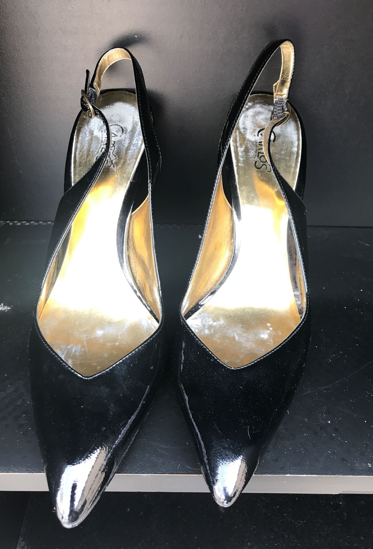 Carlos Santana sling pack pointy toe pumps