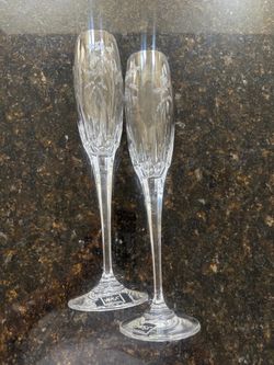 Two Mikasa champagne glasses. Excellent condition.