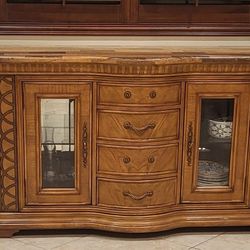 Buffet with wine rack.