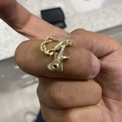 14k Gold Coin With 14k Gold Chain And 14k DiamondGuitar Stub With 