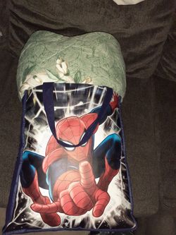 Blanket and a spider man tote bag