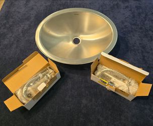 Houzer Stainless Steel bathroom sink with two stainless steel overflow assembly