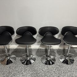 Brand new! Set Of 4 Modern Swivel Adjustable Black Leather Bar Stools