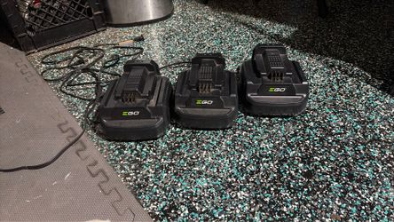 Three EGO battery chargers CH2100