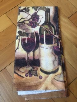 Brand new dish towel with wine bottle and wine glasses