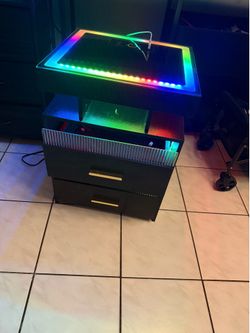 End tables with charging system and led lights