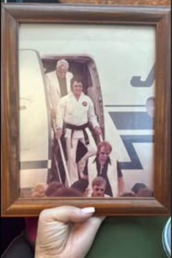 8 by 10 Original Elvis Presley on Kodak Watermarked paper Karate Gi Plane Photo Framed