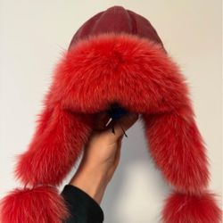 Cap-Ushanka made of natural fur.