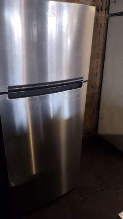 Gray and stainless steel Whirlpool refrigerator stainless steel working great condition