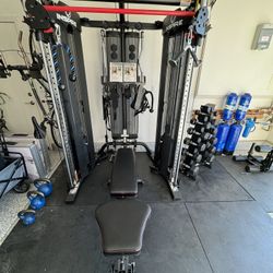 Functional Trainer With Bench, Leg Extension, Dumbbells, Kettle Bells, And Battle Rope 