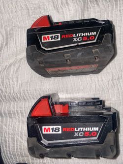 Two Milwaukee 5.0 batteries & drill
