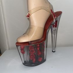 ELLIE Womens Size 11M Clear 8” Stripper Platform Heels with Roses inside the Heels and Platform  Good pre-owned condition. Some signs of wear overall,