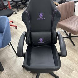 New purple recline gaming chair with footrest