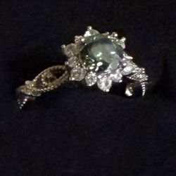 New! 1 Carat Moissanite Ring set in Sterling silver 925 in size 7 with certificate of authenticity