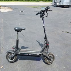 Electric Scooter 50 MPH Top Speed, 75 Mile Range