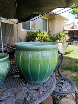 2 beautiful greenish pots