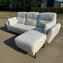 White Sectional Sofa with Reversible Ottoman