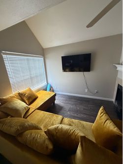 Couch, tv, table, mirror