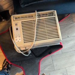 Frigidaire window air conditioner, typically featuring 5,000 BTU cooling capacity. 