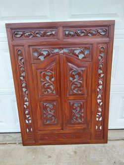 Hand-Carved Wooden Decorative Panel with Doors