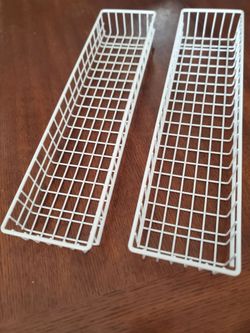 2 coated metal organizer baskets