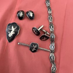 Vintage Siam Silver, Bracelate, $34, Earrings, $24, Tie Clíp Holder/hair Clip $19, Brooch $22, Cuff Links, $17, Or $90 For All