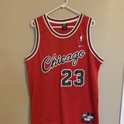 Nike Michael Jordan 23 Chicago Bulls Red Jersey Large. Used Great Condition.