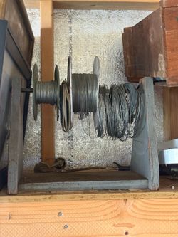 Wire Spools on Wooden Rack