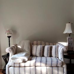 Vintage Curved Loveseat .  Soft Neutral Pattern, Elegant Silhouette