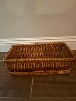 rectangular brown woven wicker storage basket featuring an open-top design and a matching base tray
