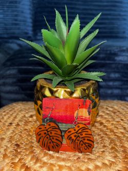 Wooden Monstera earrings made in Hawaii