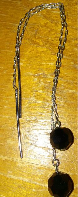 Black beads on string