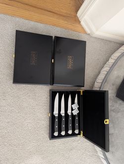 Moving sale, three brand new capital grill steak knife sets.