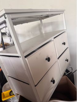 White dresser with outlet $20