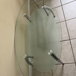 Set a three glass tables 2 sides one center