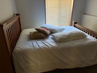Queen size bed with nice headboard and frame