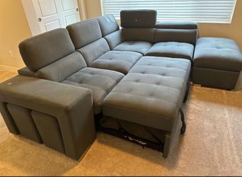 Gray Sectional Sofa with Pull-Out Bed and Ottoman